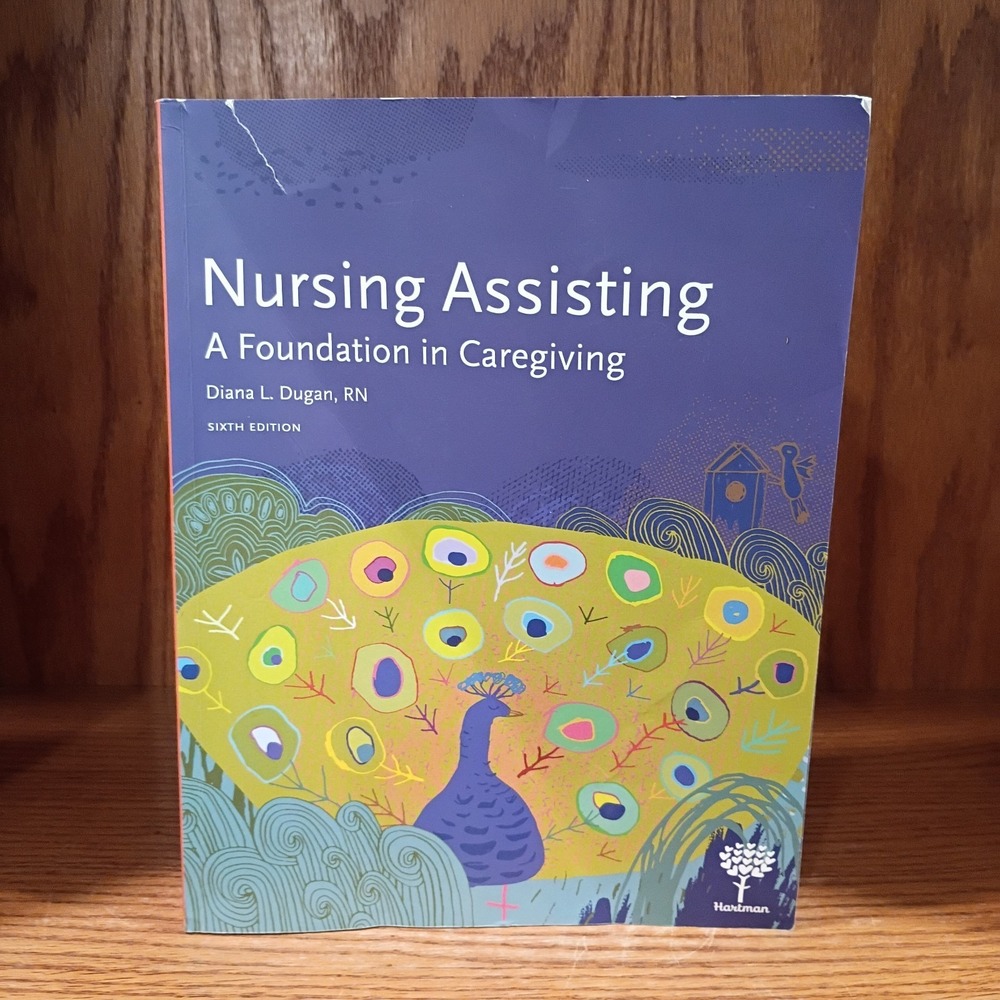 Nursing Assisting: A Foundation in Caregiving. Sixth Edition Paperback - Good
